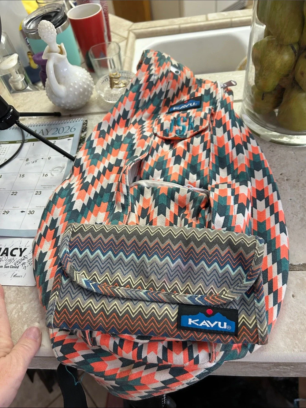 Kavu Chevron Sling Backpack in Coral, Teal & White With Wallet